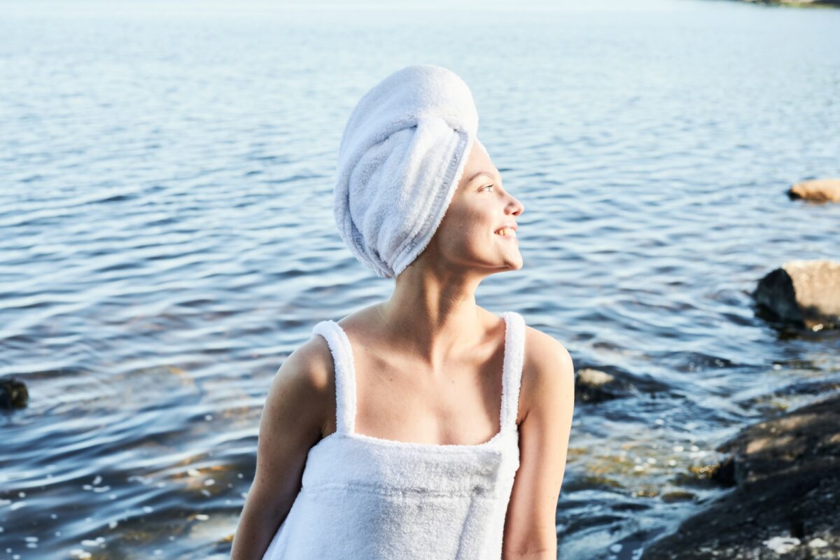 woman wearing luin living bath products